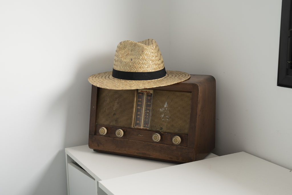 a hat on a radio