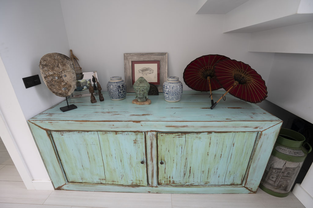 a cabinet with objects on it